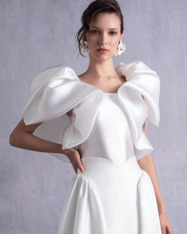CRYSTAL-DOTTED JERSY BODY WITH PETAL-LIKE ORGANZA SHOULDERS